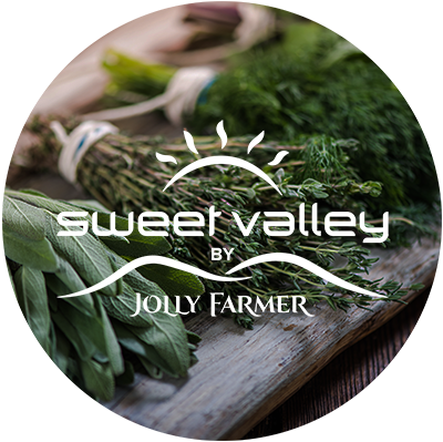 sweet valley by jolly farmer logo on background with herbs